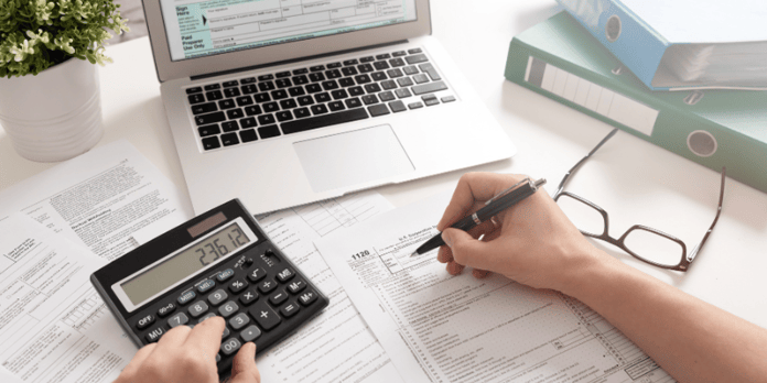 Accountant working on bank reconciliation