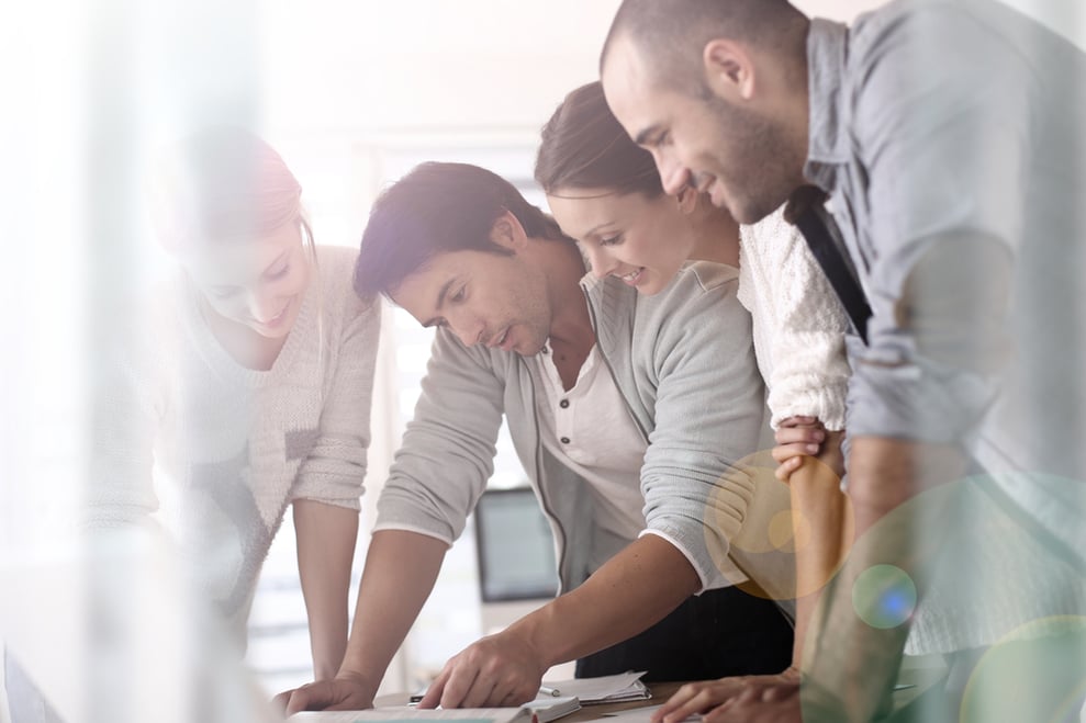 Group of business people in office working on project-1