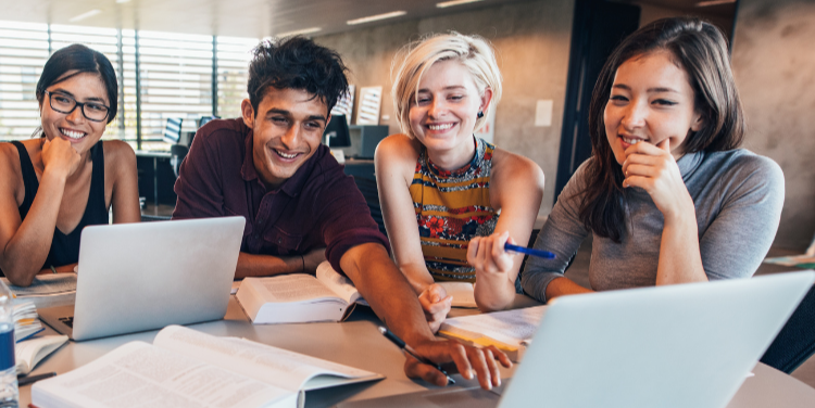 Group of university students with laptop