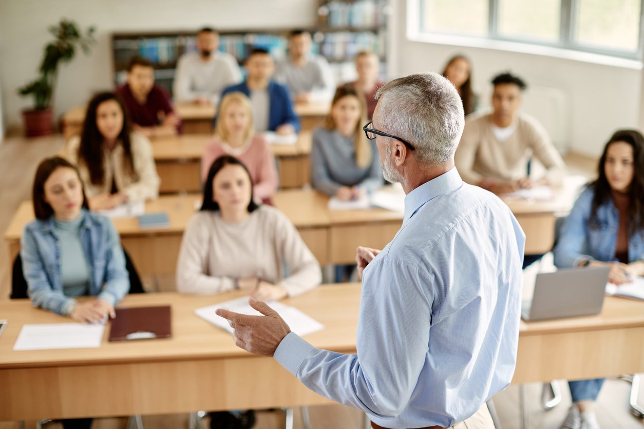 man teaching student union about accounting software